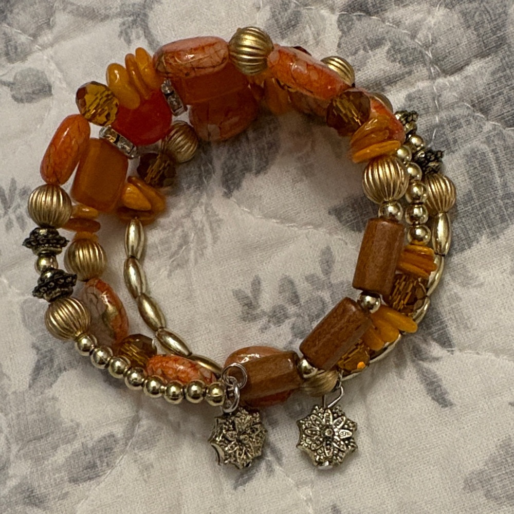 Beaded bracelet with charms